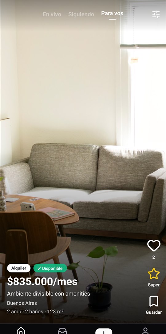 Feed de Reel Estate con un departamento en alquiler a pantalla completa: living luminoso, precio $835.000 por mes, dos ambientes y dos baños en Buenos Aires, con botones de like, súper like y guardar.